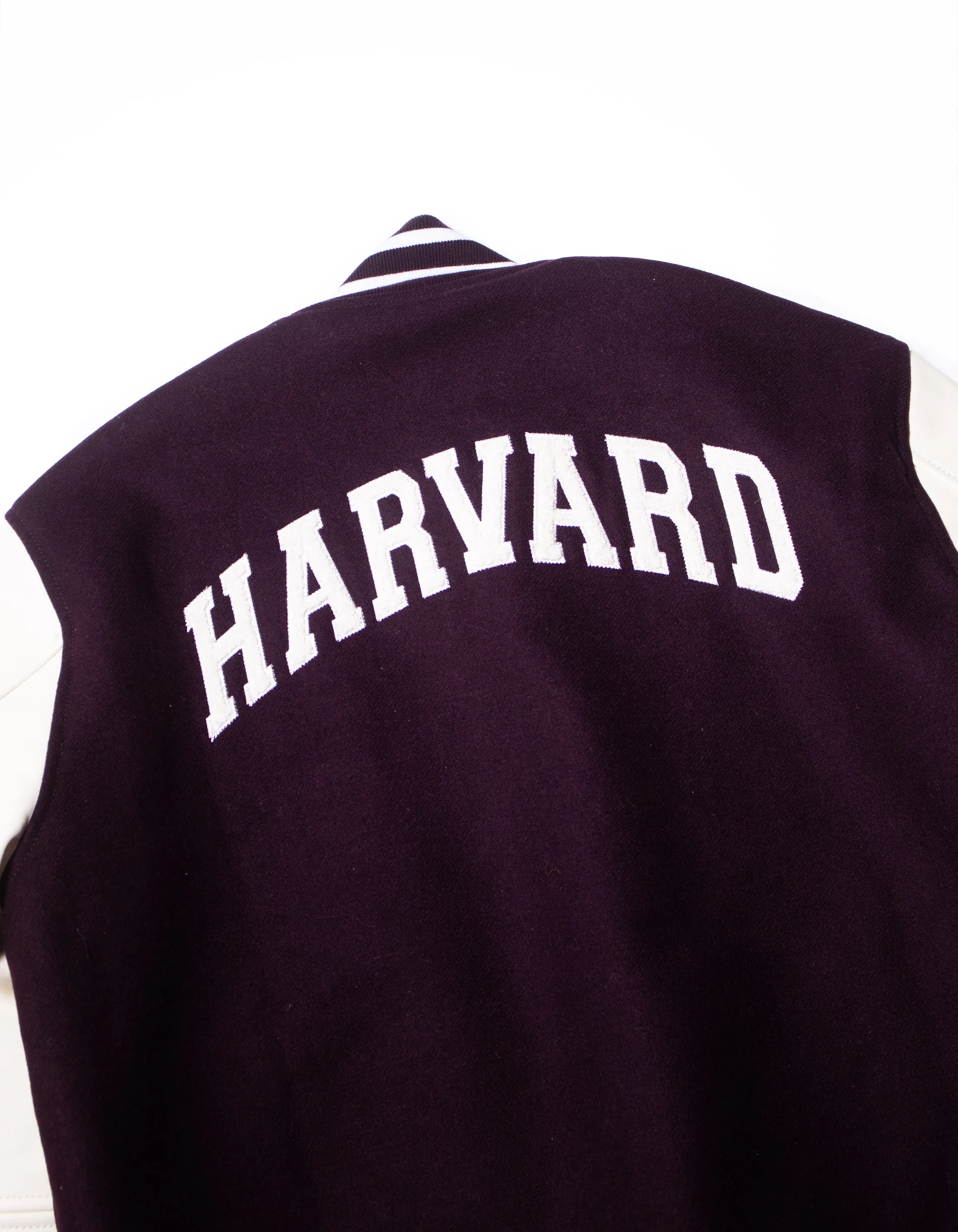 Harvard burgundy varsity jacket.