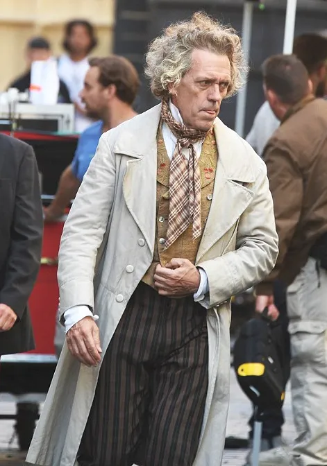 Hugh Laurie stars in The Personal History of David Copperfield with his character Mr. Dick and his distinctive coat.