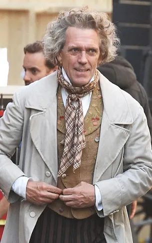 Hugh Laurie stars in The Personal History of David Copperfield with his character Mr. Dick and his distinctive coat.